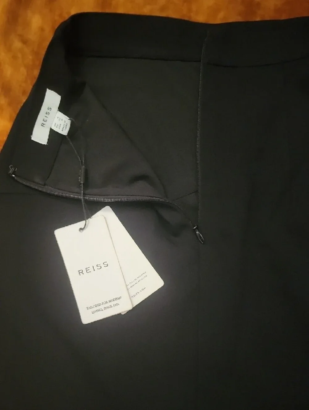 Reiss Black Mini Skirt with Curved Panel Detail